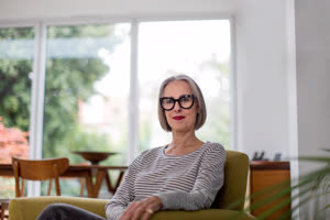Portrait of a mature adult female at home