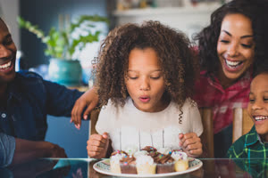 African American family celebrating a birthday