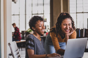 Young adults studying together in a loft apartment