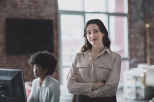 Portrait of businesswoman in a working office